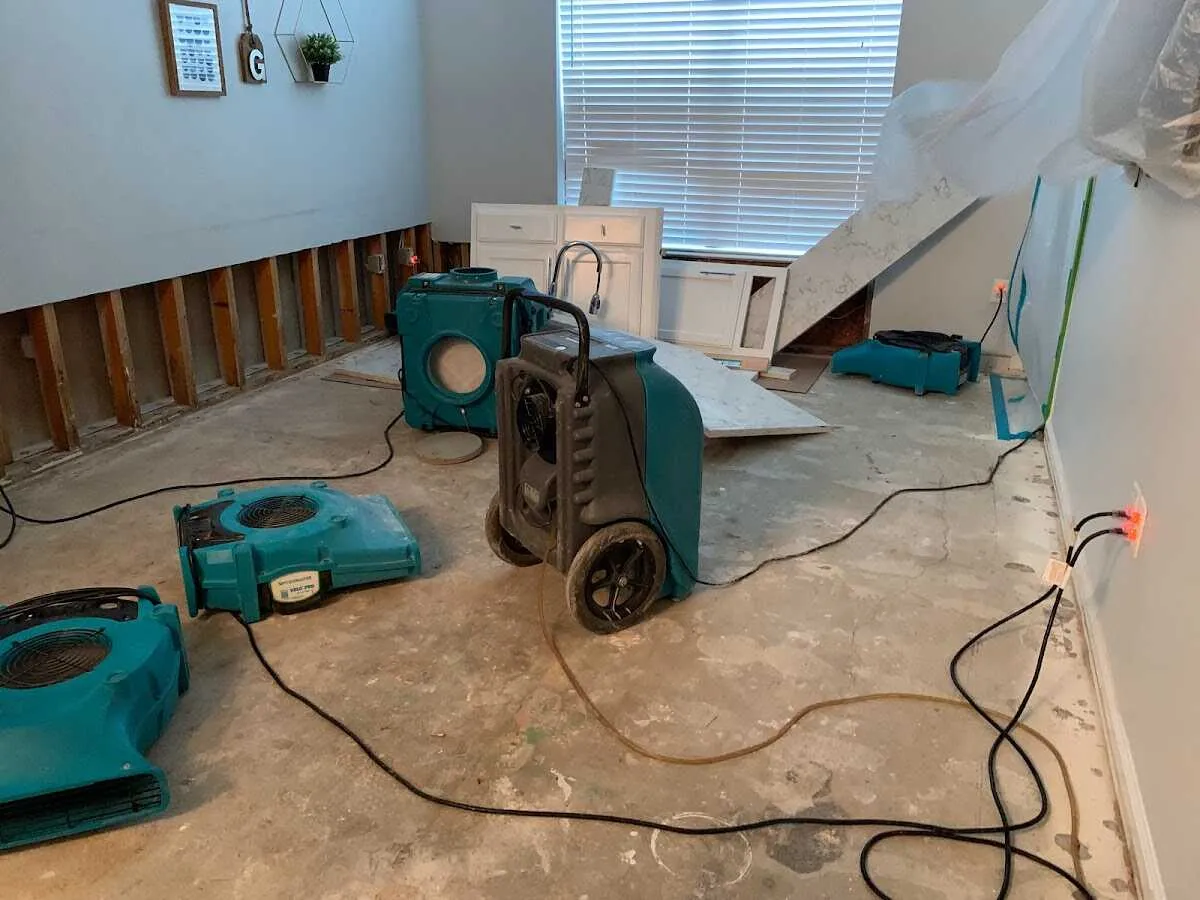 Dehumidifier in flood-cut room for Water Damage Restoration in Ensley